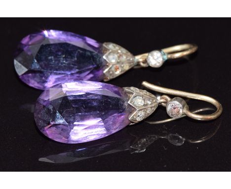 A pair of c1910 earrings set with pear cut amethyst and rose cut diamonds, 4.6g, 2.6cm long