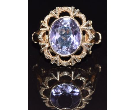 A 9ct gold ring set with an oval cut amethyst, size O, 4.9g