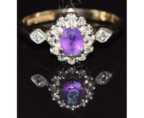 A 9ct gold ring set with an amethyst and diamonds, size K, 1.8g