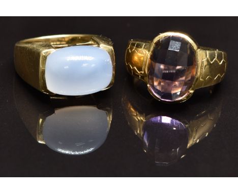 Two 9ct gold rings, one set with chalcedony the other amethyst, size N, 15.8g