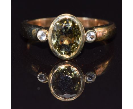 A 9k gold ring set with tourmaline and topaz, size N, 3g