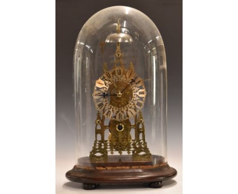 A 19thC single train fusee skeleton clock in Minster style with silvered Roman chapter ring and striking on a bell with a Hal