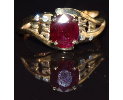 A 9ct gold ring set with a ruby and diamonds, size M, 2.8g