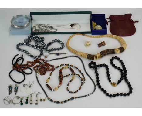 A collection of jewellery including diamanté, silver including bangle, necklace and ring, earrings, yellow metal brooch, etc