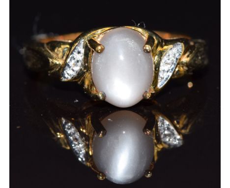 A 9k gold ring set with moonstone and topaz, size N, 3.8g