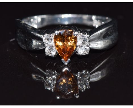 A 9k white gold ring set with zircon and topaz, size N, 3.6g