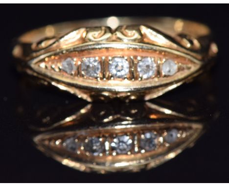 An 18ct gold ring set with five diamonds, Birmingham 1914, size M, 3g