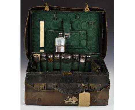 Mappin &amp; Webb gentleman's travelling case, the fitted interior with many hallmarked silver bottles and accessories to inc