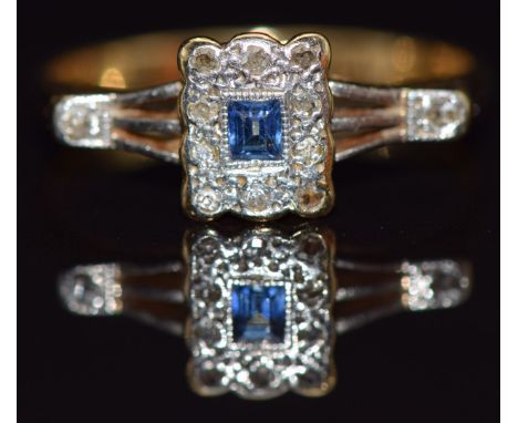 Art Deco 18ct gold ring set with a rectangular cut sapphire surrounded by diamond in a rectangular platinum setting, in vinta