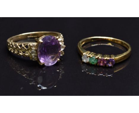 A 9ct gold ring set with a diamond, emerald, ruby and amethyst and another 9ct gold ring set with an amethyst, size N, 4.5g