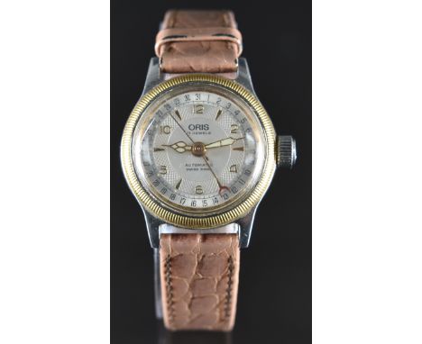 Oris calendar ladies automatic wristwatch with luminous hands, outer date ring, silver dial, gold bezel, clear&nbsp; exhibiti