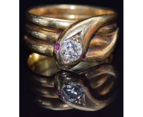 Victorian 18ct gold snake ring set with an old cut diamond and ruby eyes, London 1876, size N, 7.9g