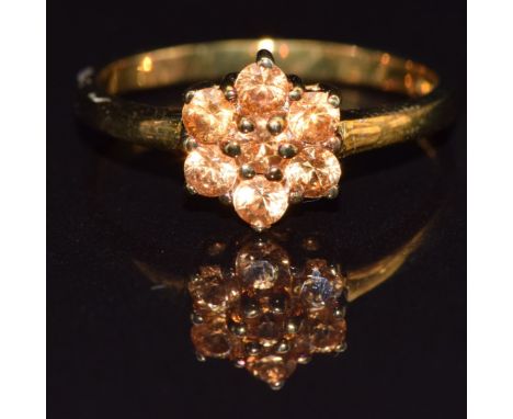 A 9k gold ring set with spessarite garnet, size M, 2g