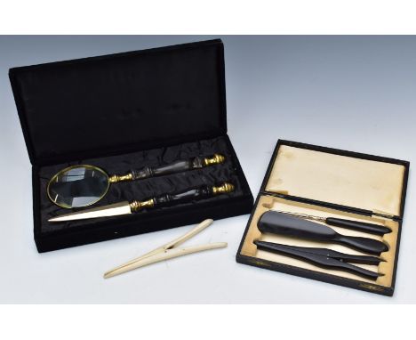 Cased magnifying glass and letter opener, cased ebony shoehorn, glove stretcher and button pull etc&nbsp;