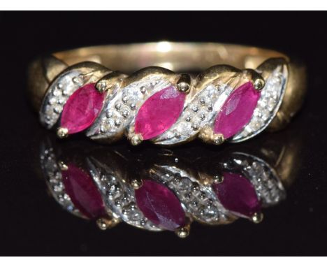 A 9ct gold ring set with rubies and diamonds, size N, 1.9g