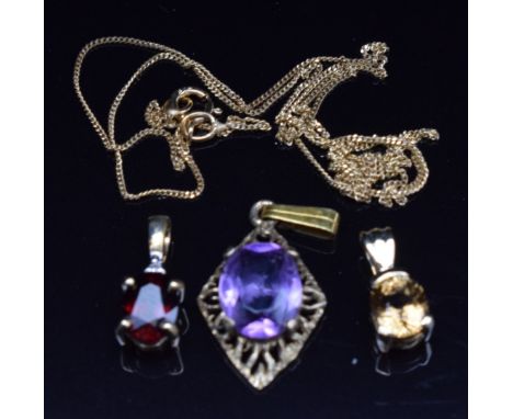 Three 9k gold pendants set with garnet and white topaz, tourmaline and amethyst and a 9ct gold chain, 3g