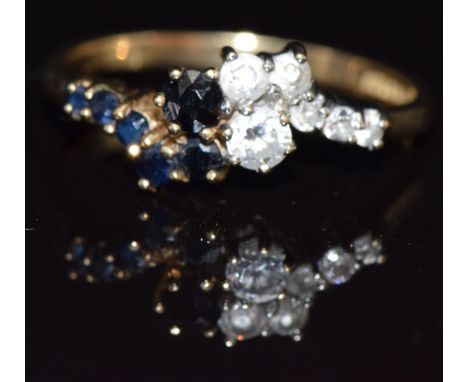 A 9ct gold ring set with sapphires and cubic zirconia size P, 2.5g