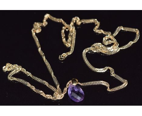 A 9ct gold necklace and 9ct gold pendant set with an amethyst, 4.8g