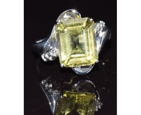 A 9k gold ring set with citrine and diamonds, size N, 3.6g