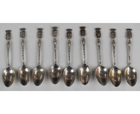 Nine French silver spoons, each with a town name and coat of arms finial, length 10.5cm, weight 65g