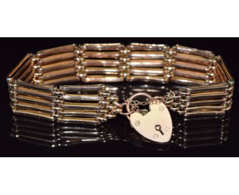 A 9ct rose gold gate bracelet with 9ct gold heart padlock/ clasp, 24g&nbsp;