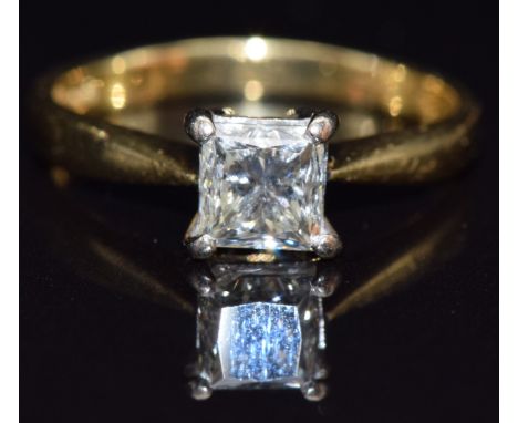 An 18ct gold ring set with a princess cut diamond of approximately 1ct, size L/M, 3.5g
