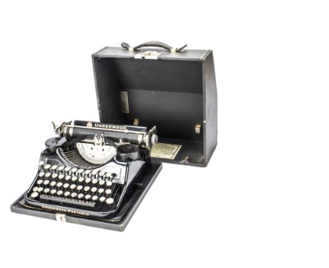 An Underwood typewriter, portable model, in case, with Warranty dated 1932