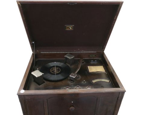 An autochange radiogram, HMV Model 531, with No 15 pick-up, wavelength dial and walnut case with lid key, felt-lined lid and 