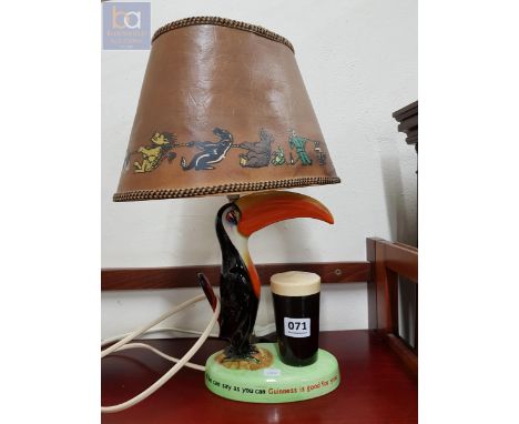 AN ORIGINAL GUINNESS TOUCAN LAMP WITH ORIGINAL SHADE - CARLTONWARE
