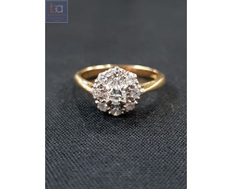 18 CARAT YELLOW GOLD RING WITH CIRCA 0.33 CARAT OF DIAMONDS 