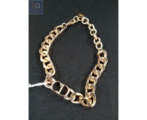 CHRISTIAN DIOR GOLD TONE BRACELET 