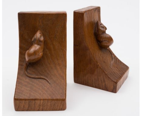 A pair of Mouseman light oak bookends, by Robert Thompson of Kilburn: 16cm. high.
