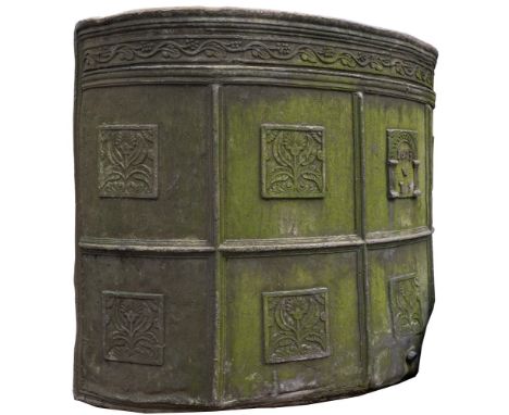 A 17th Century lead water cistern:, of D shaped outline with a curved back, the frieze decorated with a continuous band of le