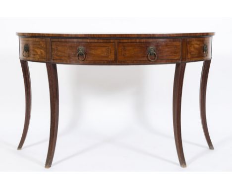 A Regency mahogany and inlaid demi lune pier table:, bordered with ebonised lines, having a curved back and fitted with two c