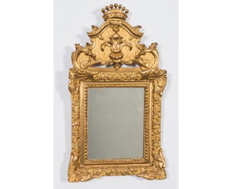 A 19th Century Swedish carved giltwood mirror:, with shaped and moulded cresting with incised lattice and acanthus scroll orn