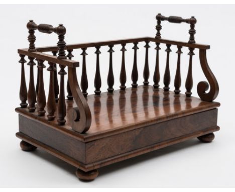 An early 19th Century rosewood twin-handled book carrier: of rectangular outline, the galleried back and sides with slender b