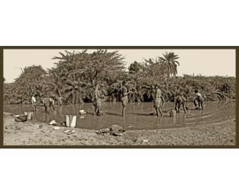 Noel Chanan [b.1939]-
Dhobi women, Deccan Plateau, 1999
selenium-toned silver print, printed 1999:-
21.5 x 50.5cm.

Photograp