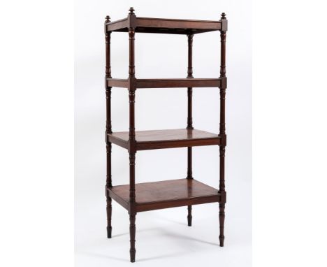 An early 19th Century mahogany rectangular four tier whatnot:, with turned finials and column uprights, on ring turned tapere