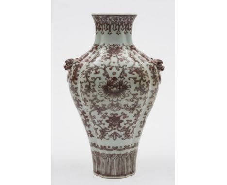 A Chinese underglaze copper-red decorated quadrilobed vase: with mythical beast head ring handles, painted with peonies and s