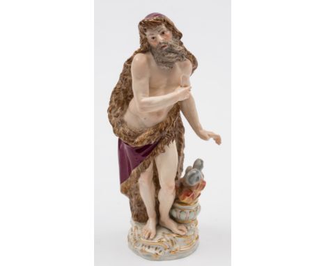 A Meissen figure allegorical of winter: after the original by J.J.Kaendler, the beaded man wearing a fur lined cloak, a flami