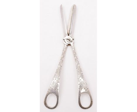 A pair of Victorian silver grape shears, maker Henry Wilkinson & Co, Sheffield, 1894: of plain form with foliate engraved han
