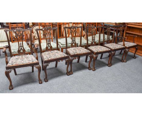 A Set of Six Carved Mahogany Dining Chairs, in Chippendale Style, comprising two carvers and four side chairs