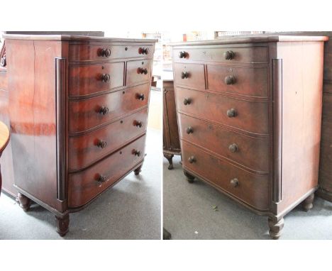 A Pair of Victorian Bow Front Five Height Chests of Drawers, with column supports, on octagonal feet and with Bramah type loc