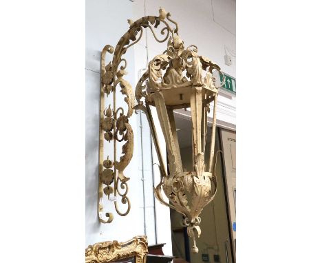 A French Painted Metal Wall Lantern, with foliate wall bracket supporting the tapering hexagonal light, approx 95cm high