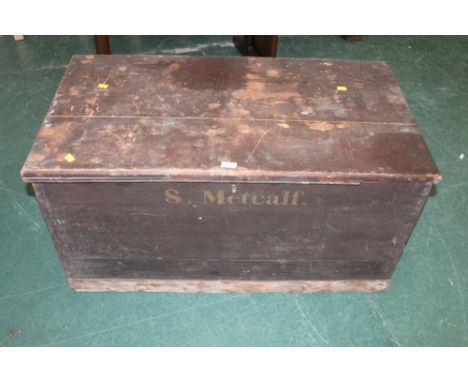 Pine trunk labelled "S Metcalf"