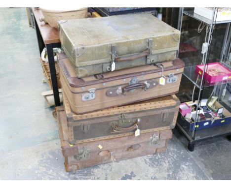 Four vintage leather suitcases and trunks 