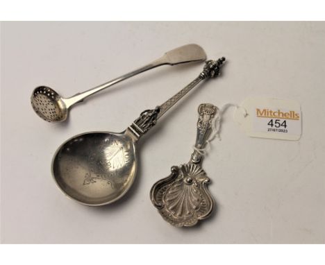 Continental spoon stamped 830, sifting spoon and white metal caddy spoon 