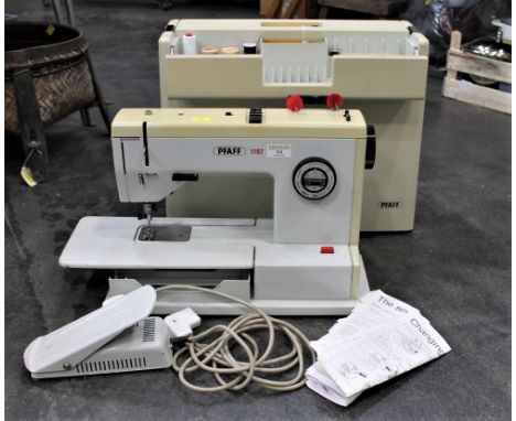 Pfaff Model 1197 electric sewing machine with case, accessories and manual 