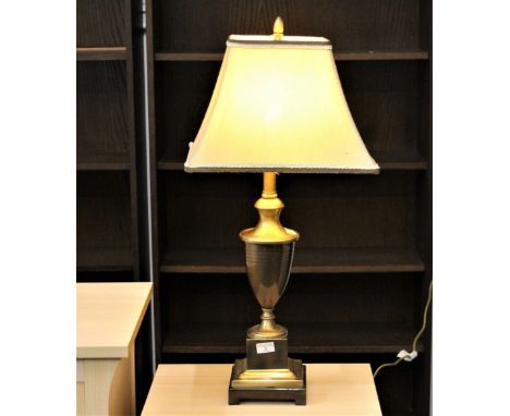 Metal column form lamp base with shade