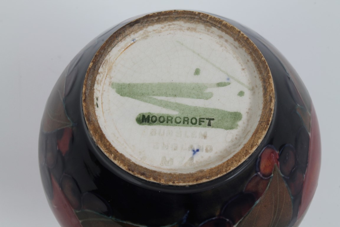 Moorcroft pottery vase decorated in the Pomegranate pattern with